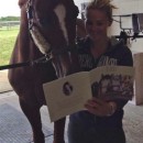 Olivia Oakeley and her dressage horse Donna Summer, taking a well earned break, following coming 5th in the European Young Riders Championships in Arezzo Italy. Ted gave her horse a copy of his book.